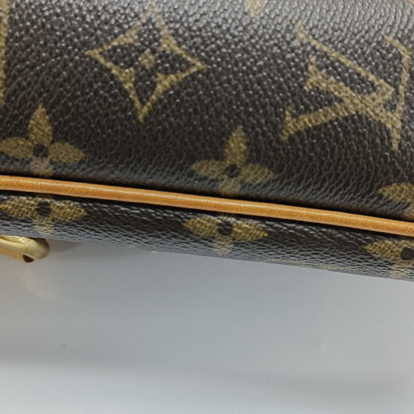 TIKAL Monogram Coated Canvas Brown
