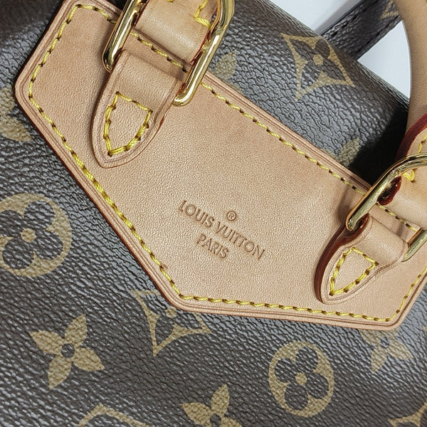 EXCURSION PM Monogram Coated Canvas Brown