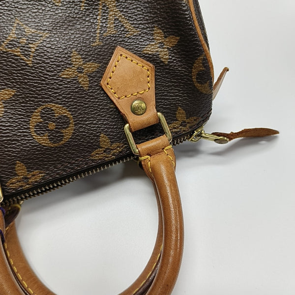 SPEEDY Monogram Coated Canvas Brown