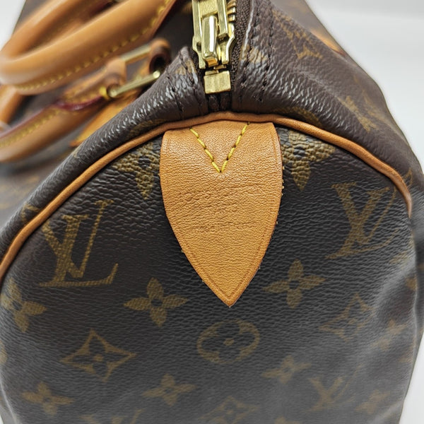 SPEEDY 30 Monogram Coated Canvas Brown