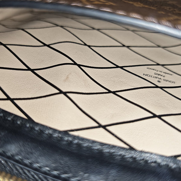 TRUNK Monogram Coated Canvas Brown