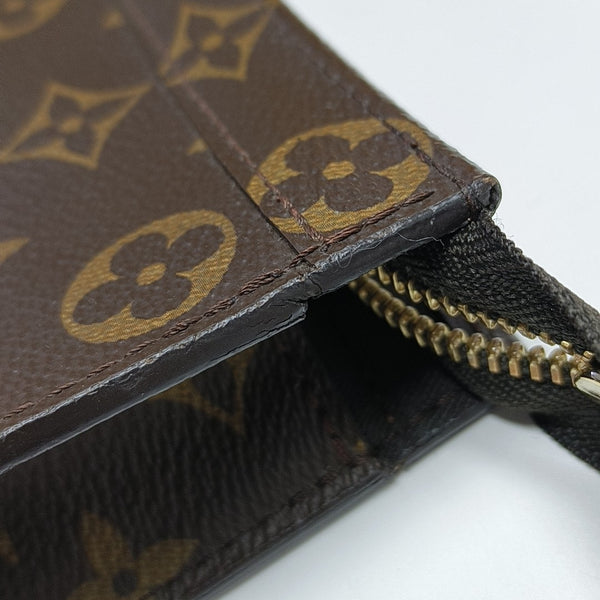 Pochette Voyag MM Monogram Coated Canvas Blue