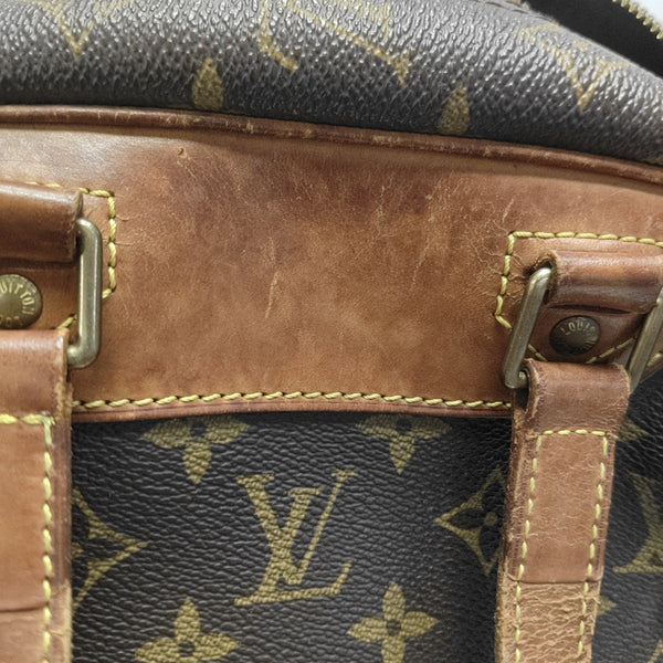 EXCURSION Monogram Coated Canvas Brown