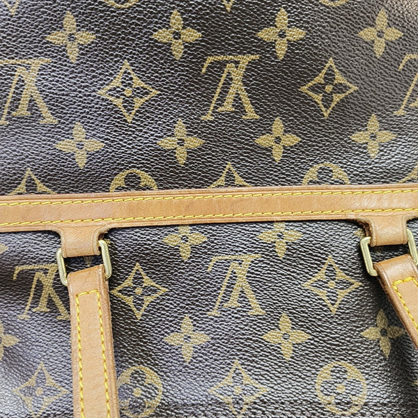 COUSSIN GM Monogram Coated Canvas Brown