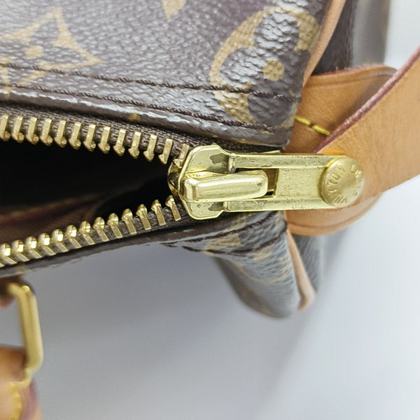 SPEEDY 25 Monogram Coated Canvas Brown