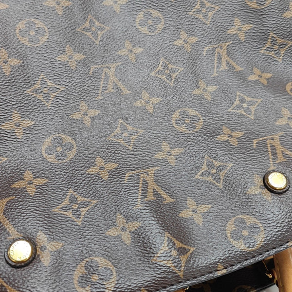 MONTAIGNE Monogram Coated Canvas Brown