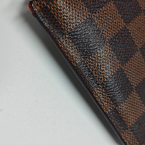 Damier Ebene Coated Canvas Clutch Brown