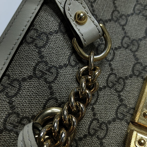 Padlock Small Monogram Coated Canvas Beige