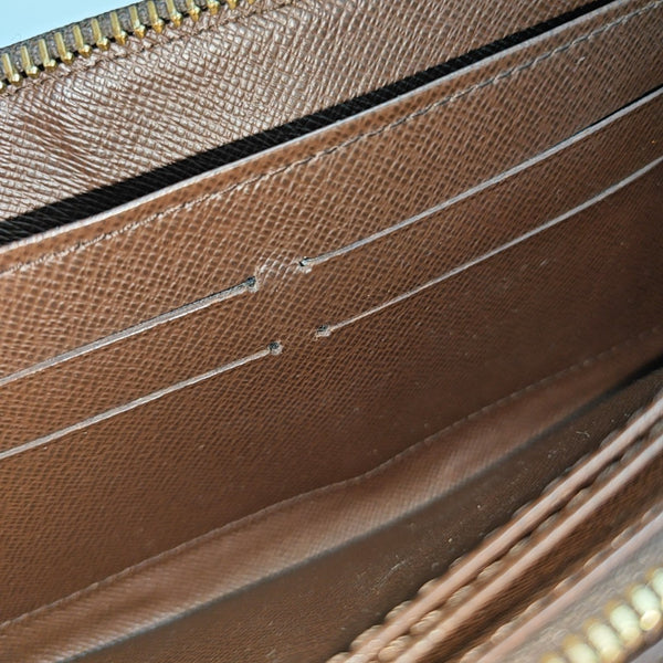 ZIPPY Damier Ebene Coated Canvas Brown Wallet