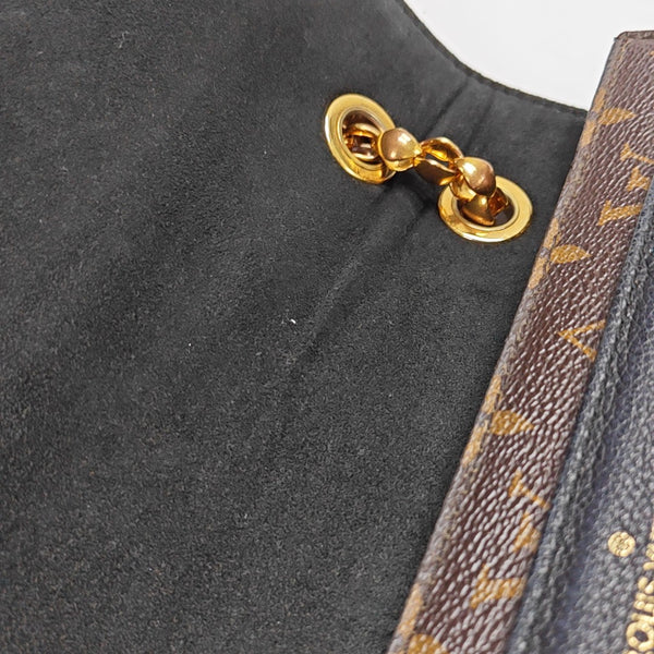 VICTOIRE Monogram Coated Canvas Brown