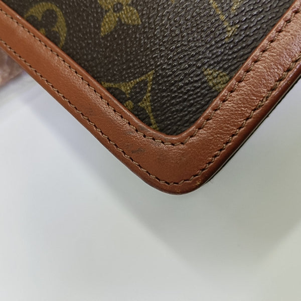 DAME Monogram Coated Canvas Brown