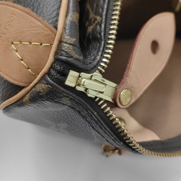 SPEEDY 25 Monogram Coated Canvas Brown