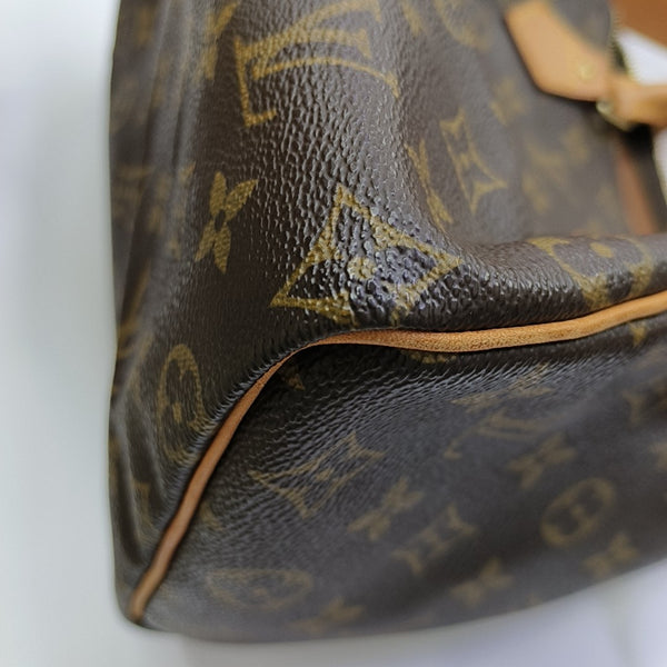SPEEDY 25 Monogram Coated Canvas Brown