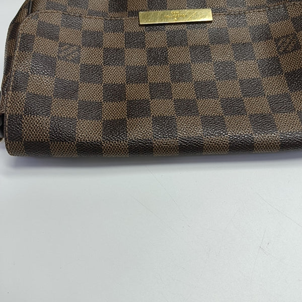 FAVORITE PM Coated Canvas Brown