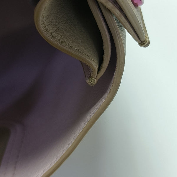 Christian Addict Calfskin Beige