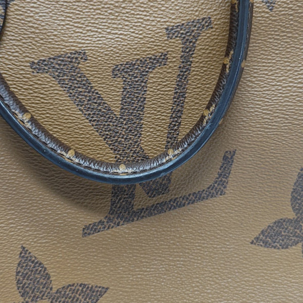 ONTHEGO MM Monogram Coated Canvas Brown