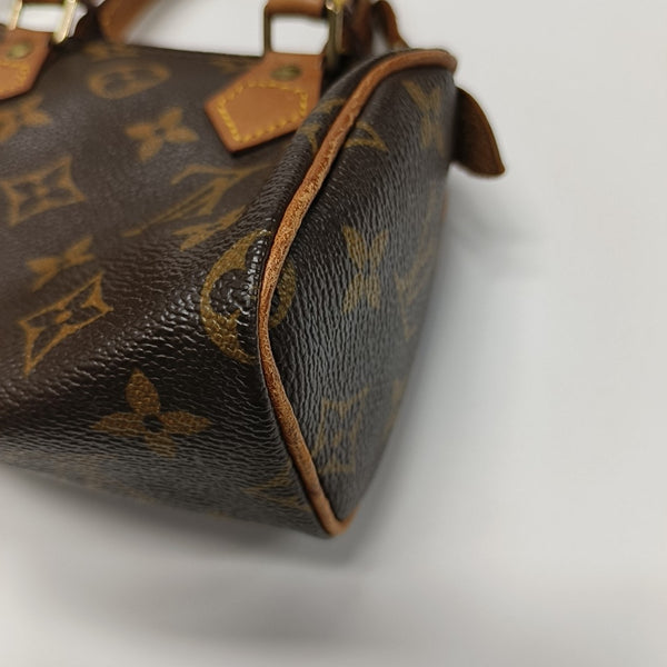 SPEEDY Monogram Coated Canvas Brown