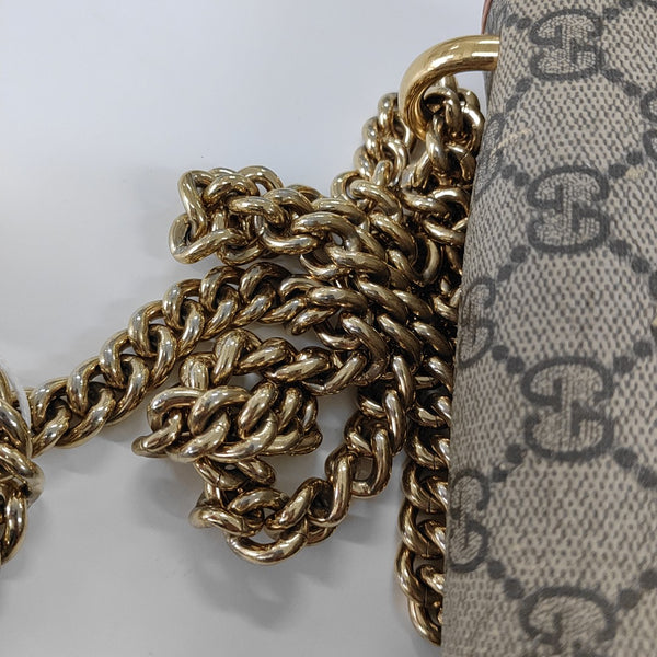 Candado pequeño Monogram lona revestida beige
