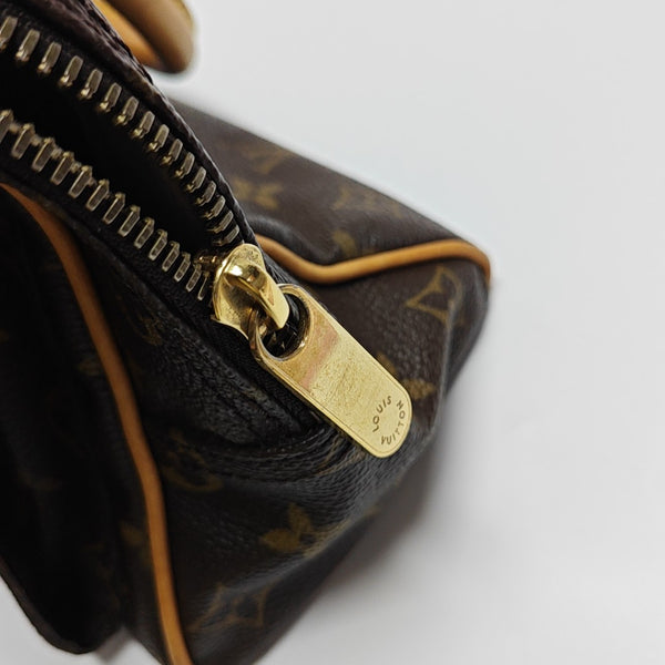 MANHATTAN PM Monogram Coated Canvas Brown