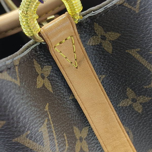 MONTAIGNE Monogram Coated Canvas Brown