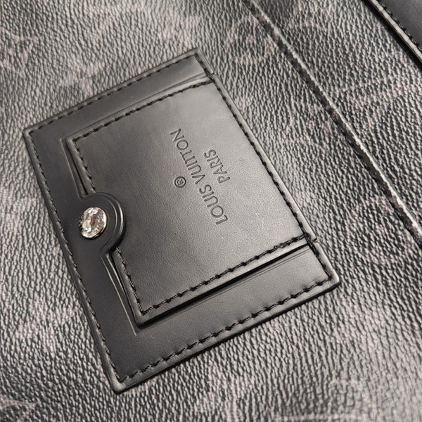 VOYAGER PM Monogram Coated Canvas Black