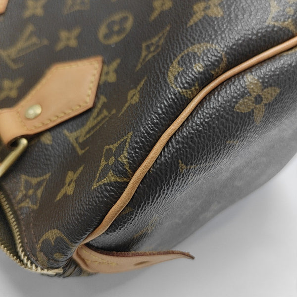 SPEEDY 25 Monogram Coated Canvas Brown
