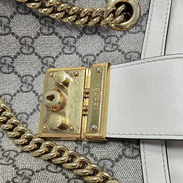 Padlock Small Monogram Coated Canvas Beige