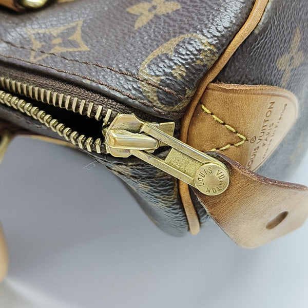 SPEEDY 25 Monogram Coated Canvas Brown