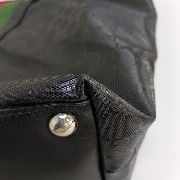 Rania Monogram Coated Canvas Black