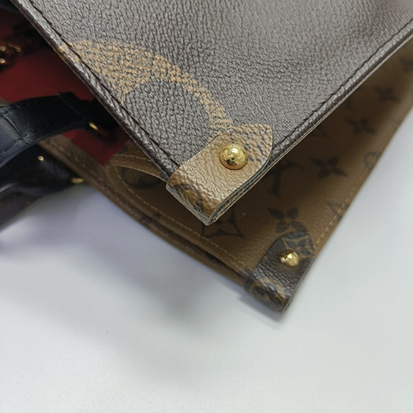 ONTHEGO MM Monogram Coated Canvas Brown