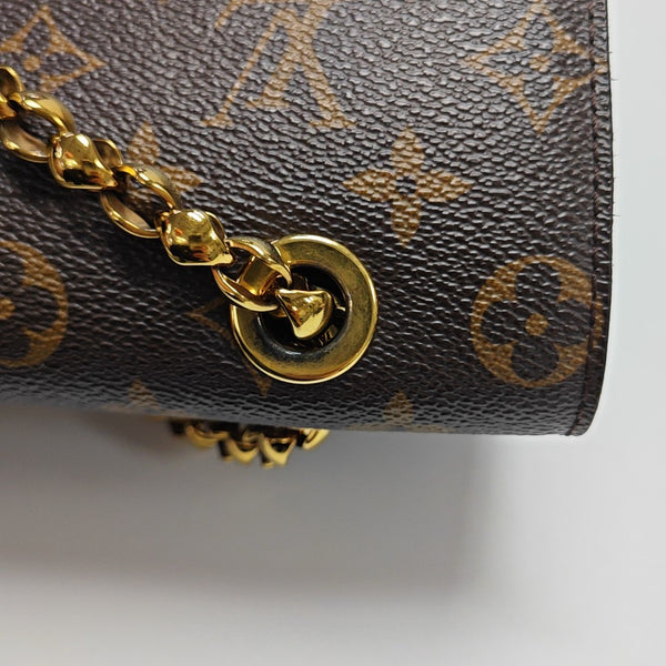 VICTOIRE Monogram Coated Canvas Brown