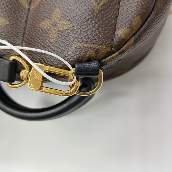 PALM SPRINGS Mini Monogram Coated Canvas Brown