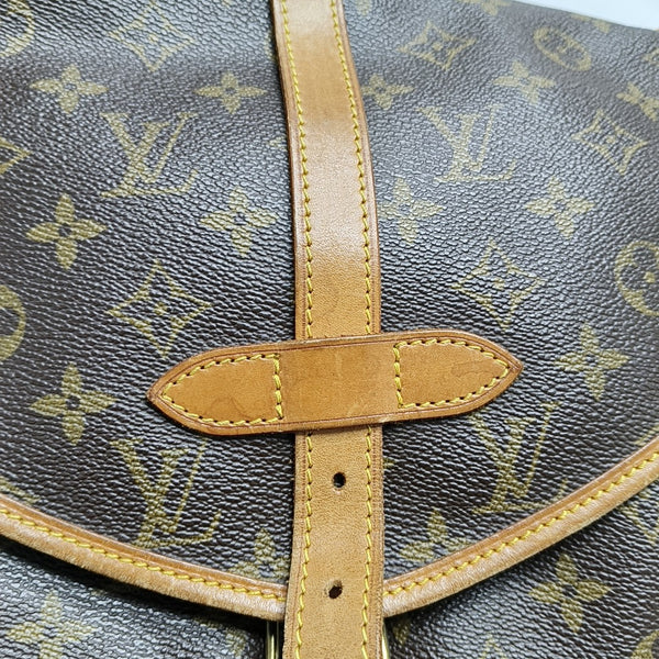 SAUMUR Monogram Coated Canvas Brown