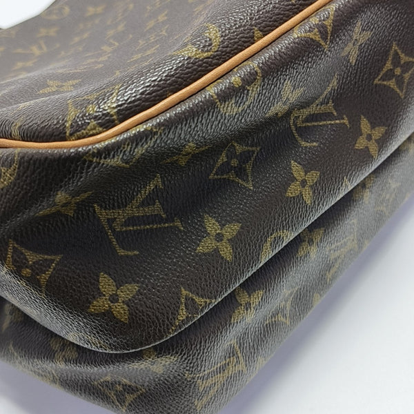 REPORTER GM Monogram Coated Canvas Brown