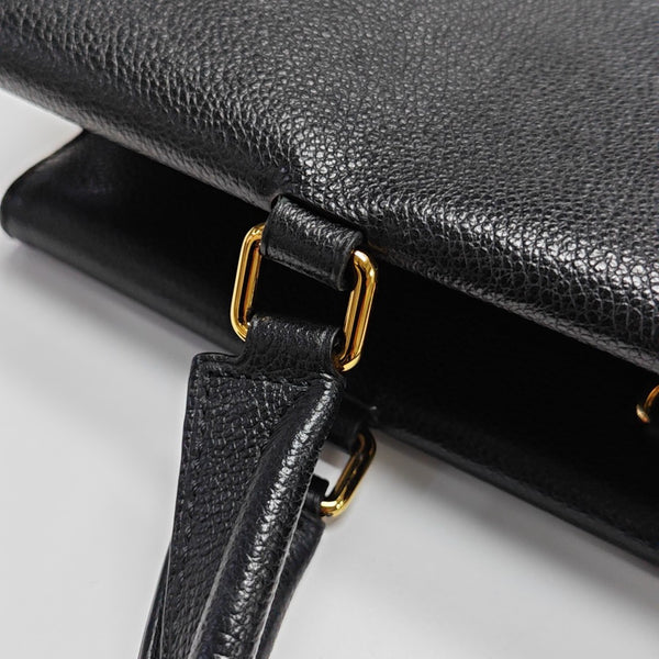VÉNUS Monogram Coated Canvas Brown