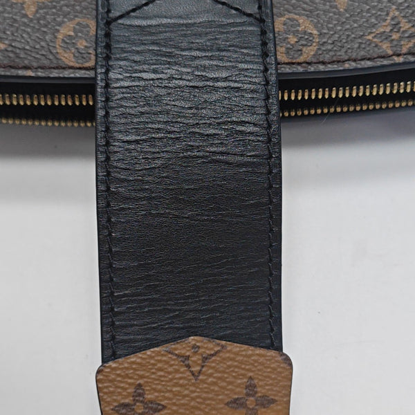 TRUNK Monogram Coated Canvas Brown