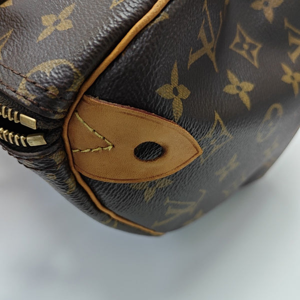 SPEEDY 25 Monogram Coated Canvas Brown