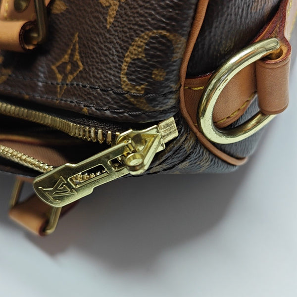 SPEEDY 25 Monogram Coated Canvas Brown