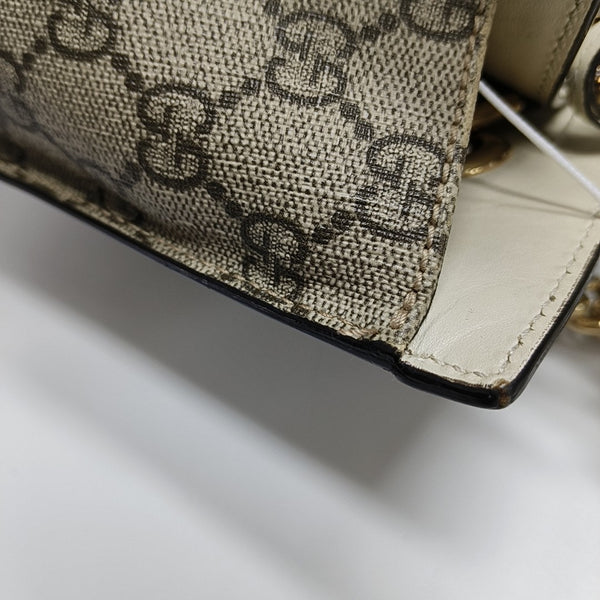 Padlock Small Monogram Coated Canvas Beige