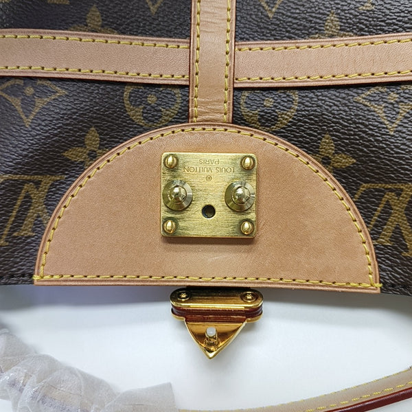 DUFFLE Monogram Coated Canvas Brown