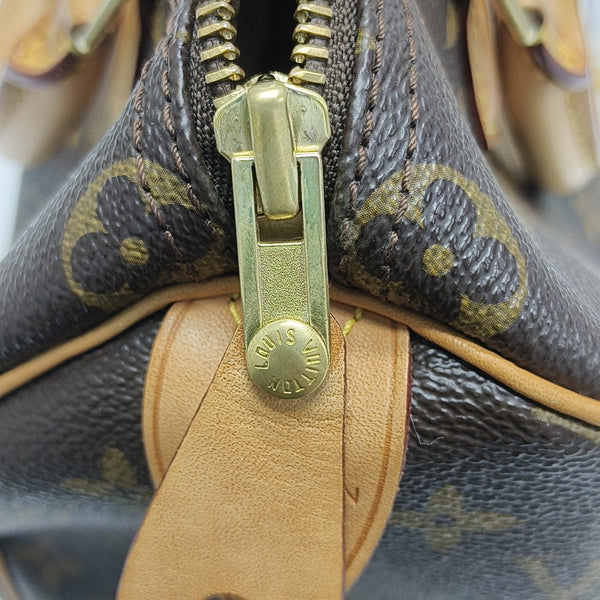 SPEEDY 25 Monogram Coated Canvas Brown