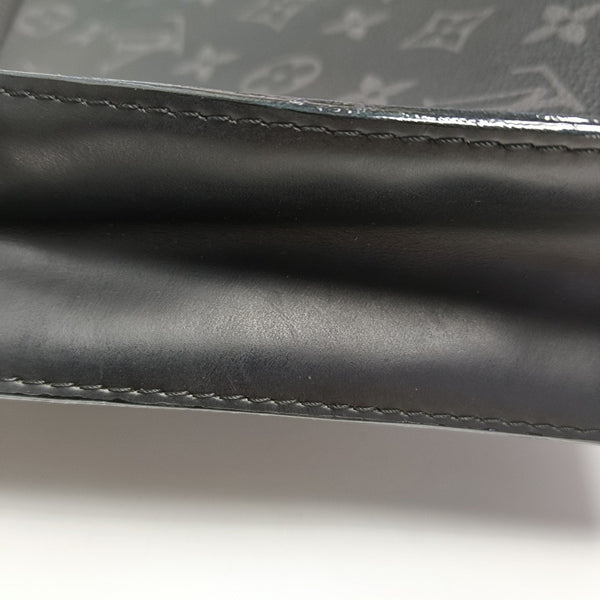 Pochette Voyag MM Monogram Coated Canvas Black