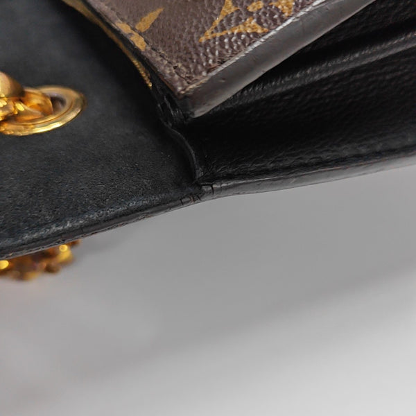 VICTOIRE Monogram Coated Canvas Brown