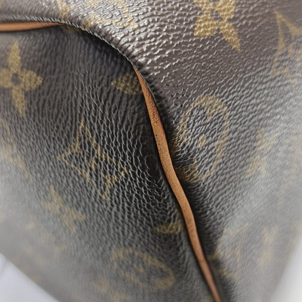 SPEEDY 25 Monogram Coated Canvas Brown