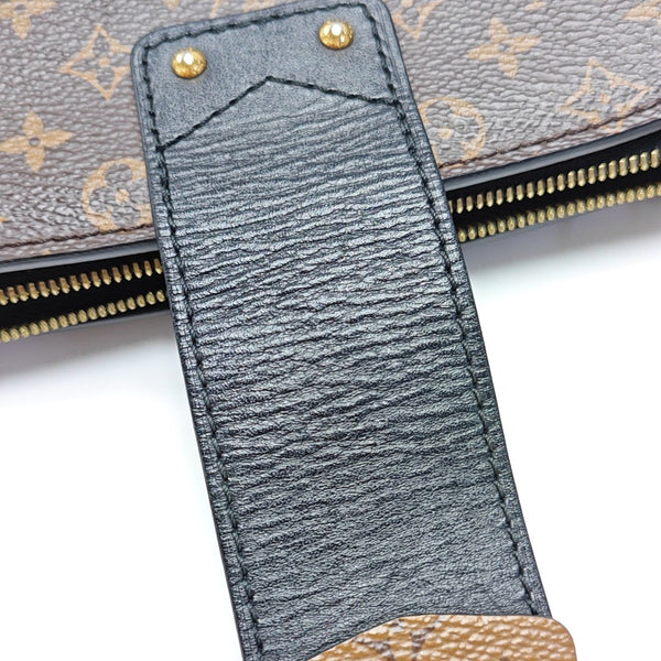 TRUNK Monogram Coated Canvas Brown