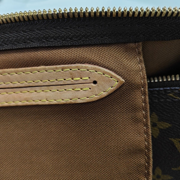 SPEEDY 35 Monogram Coated Canvas Brown