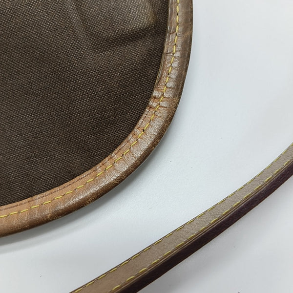 MENILMONTANT PM Monogram Coated Canvas Brown