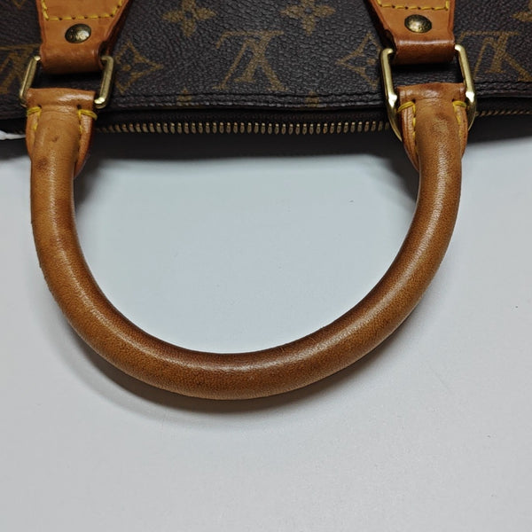 ALMA PM Monogram Coated Canvas Brown
