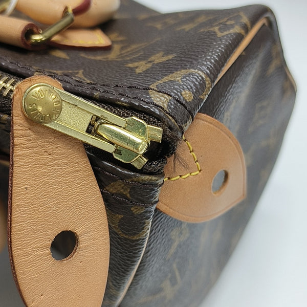 SPEEDY 25 Monogram Coated Canvas Brown