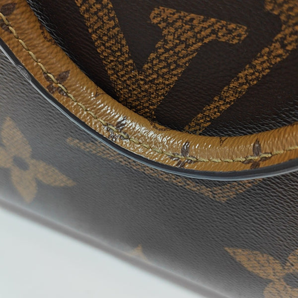 ONTHEGO MM Monogram Coated Canvas Brown